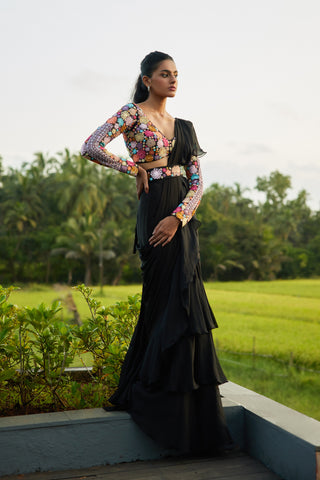 Black ruffle sari with multi color PF blouse and belt